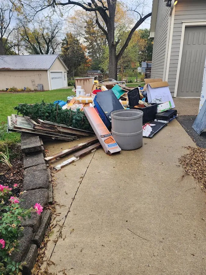 Dumpster being loaded with debris for 30 Yard Dumpster Rental in Crestline